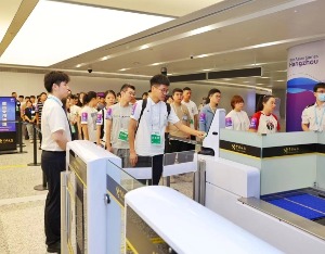 1小时内340名“运动员”入境，杭州机场开展“赛时一天”压力测试